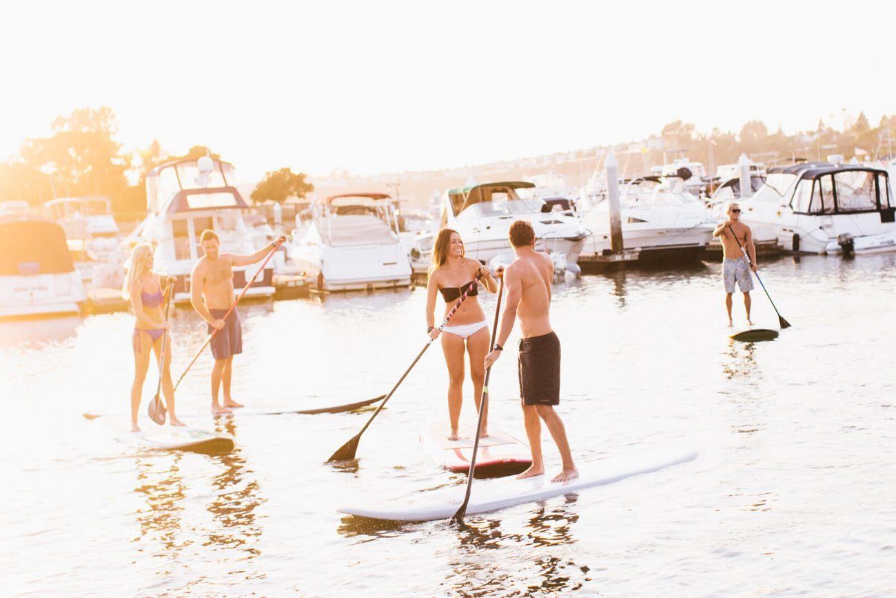 Group paddle boarding event in Newport Beach
