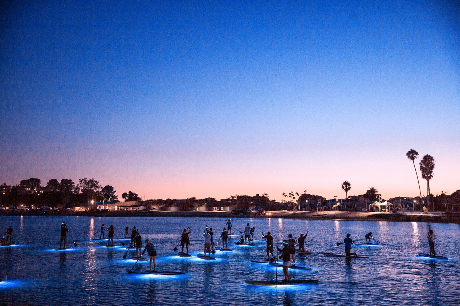 SUP Glow night paddle boarding in Newport Beach