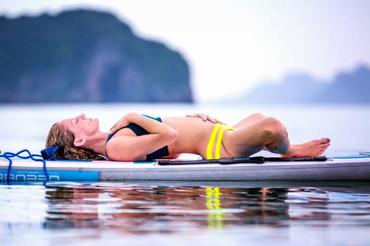 SUP yoga class on paddle boards in Newport Beach