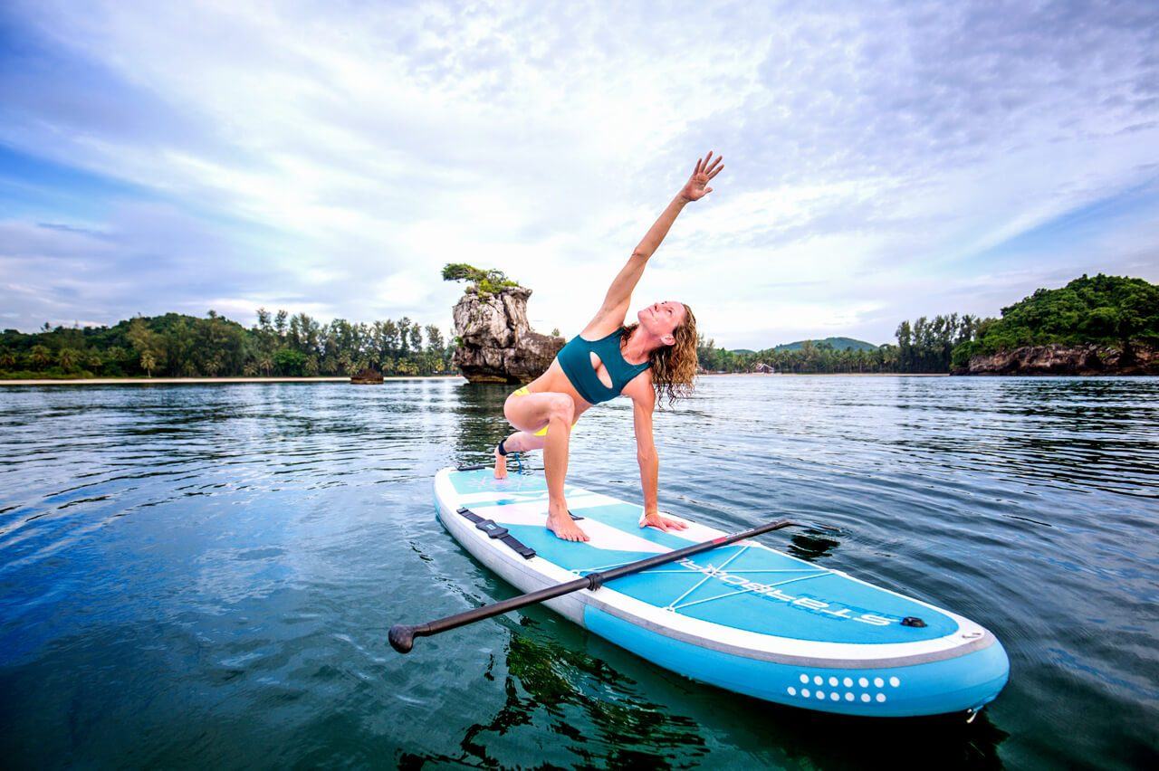 SUP yoga class on paddle boards in Newport Beach
